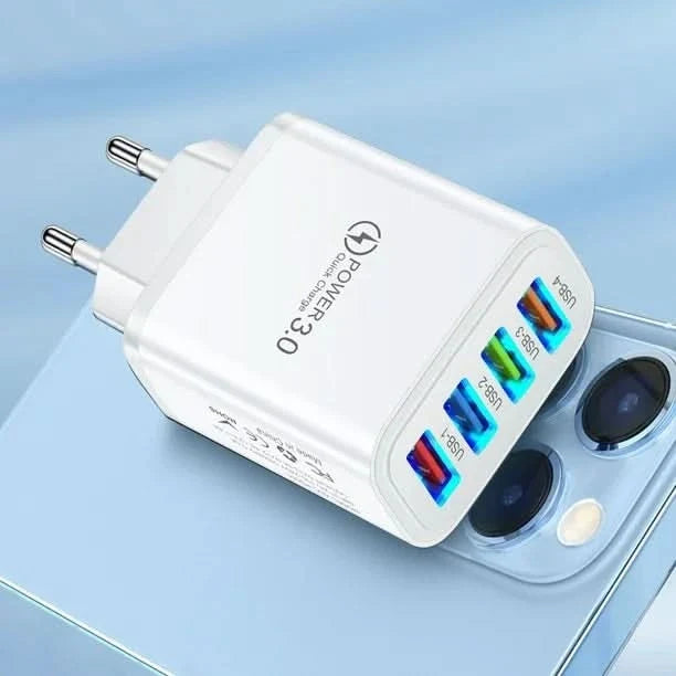 Cargador USB 40W con 4 dispositivos conectados en uso – Mil Ideas
