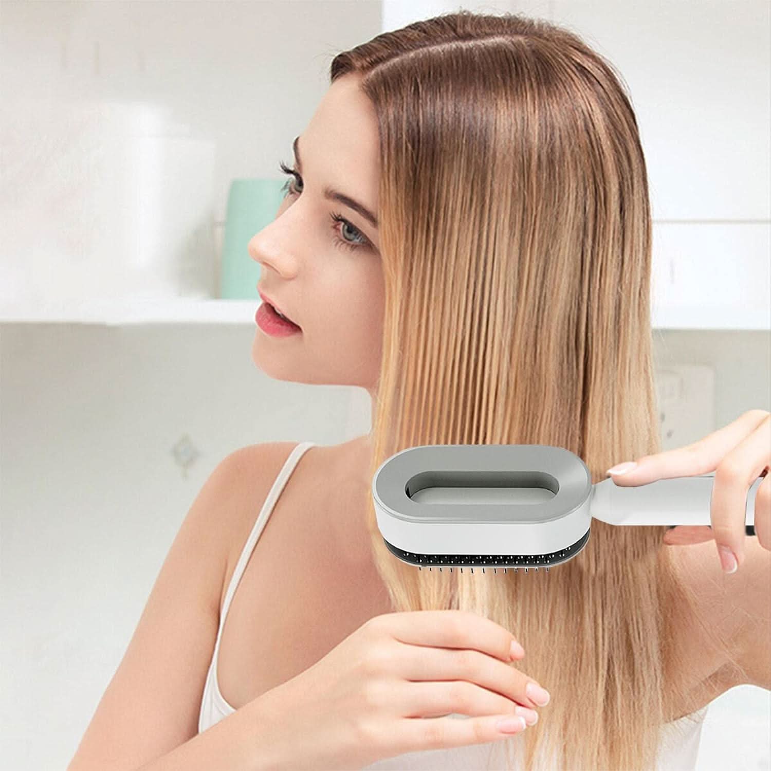 Cepillo de pelo autolimpiante en uso – Mil Ideas