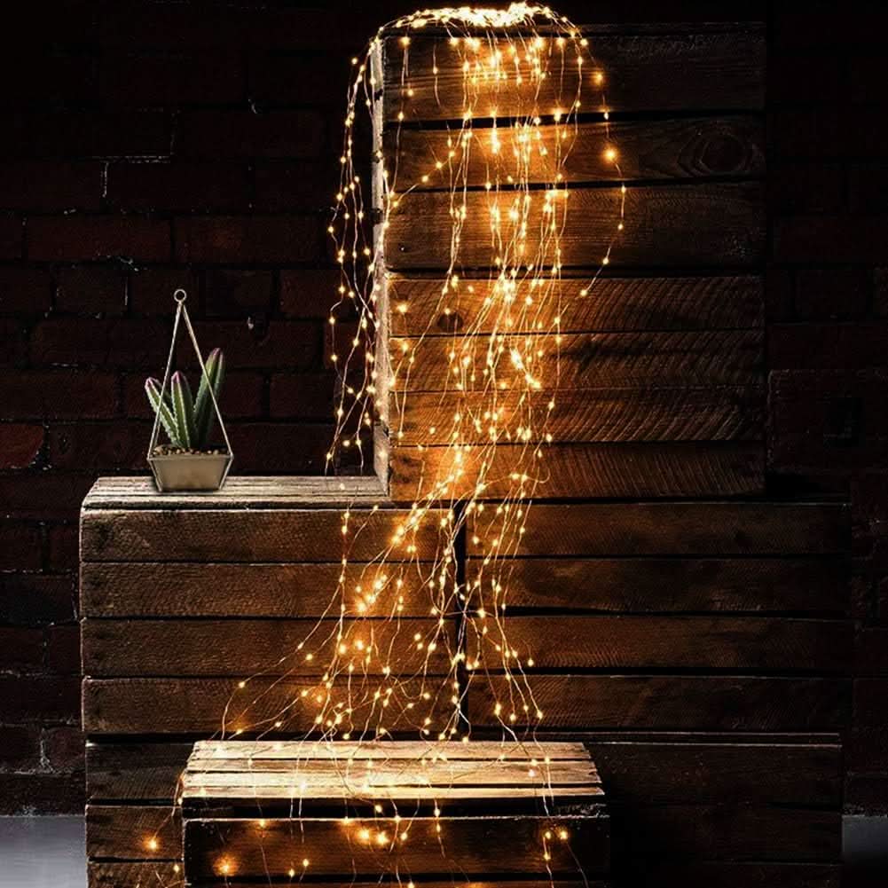 Luces Firefly navideñas 100 LED cálidas detalle – Mil Ideas
