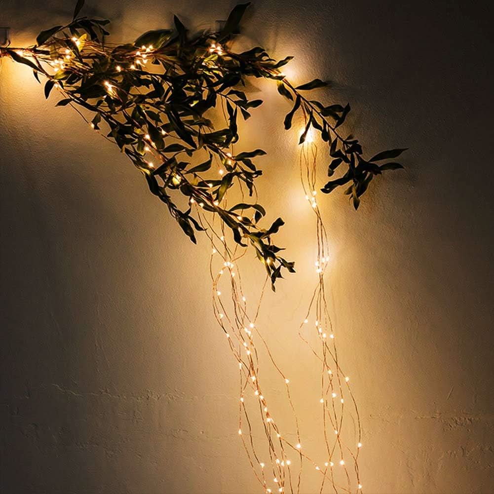Luces Firefly navideñas 100 LED cálidas en uso – Mil Ideas
