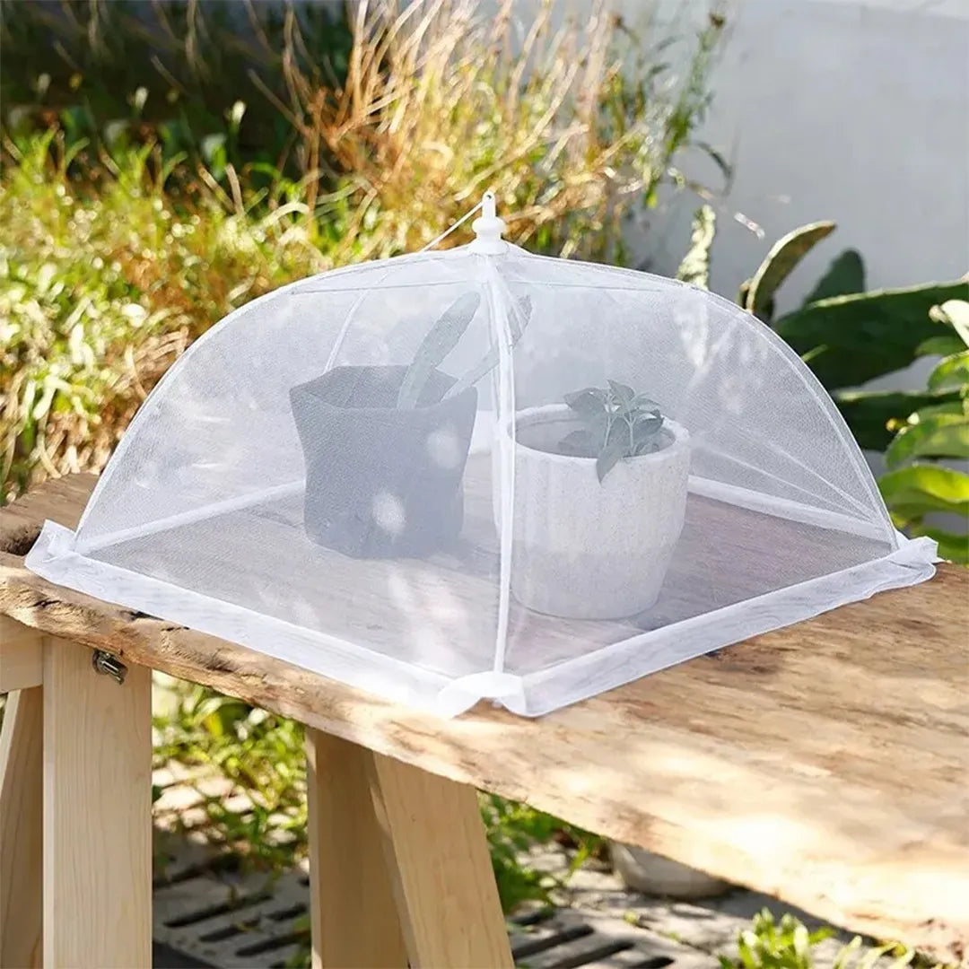 Cubiertas anti moscas para mesa de jardín en uso – Mil Ideas
