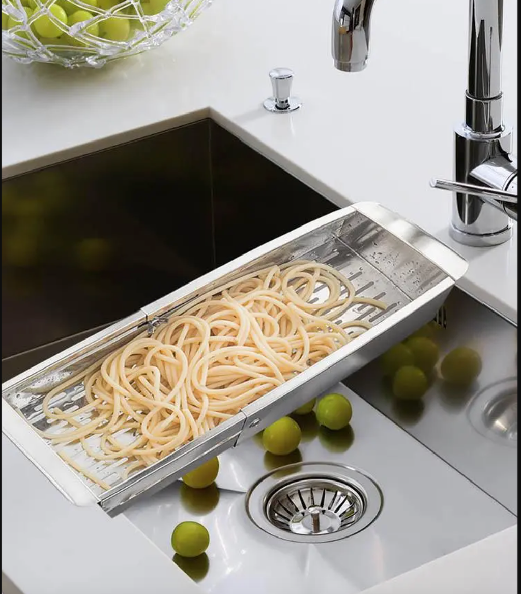 Colador extensible de acero inoxidable en uso – Mil Ideas