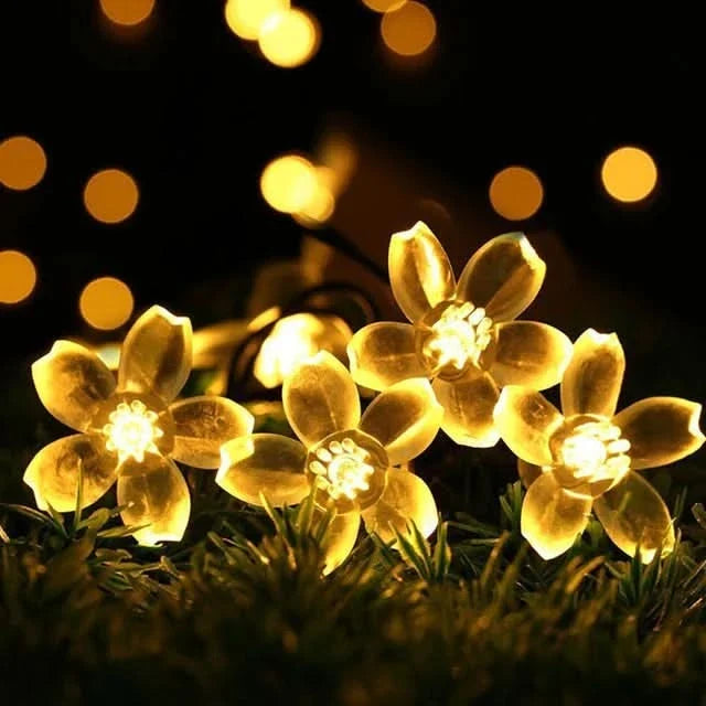 Luces solares flores en jardín en uso – Mil Ideas