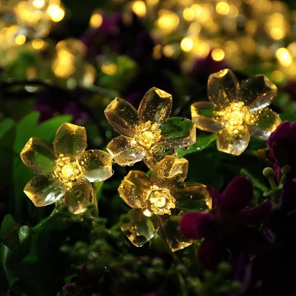 Flores luminosas con panel solar encendidas vista adicional – Mil Ideas
