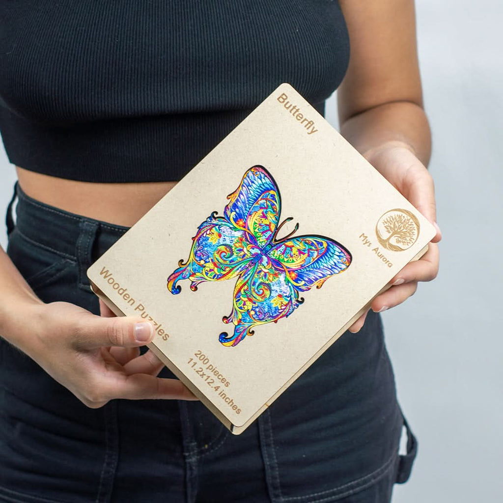 Puzzle de madera mariposa en uso armando – Mil Ideas