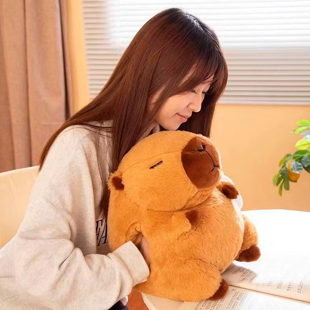Peluche capibara con bolsa de agua caliente para manos – Mil Ideas